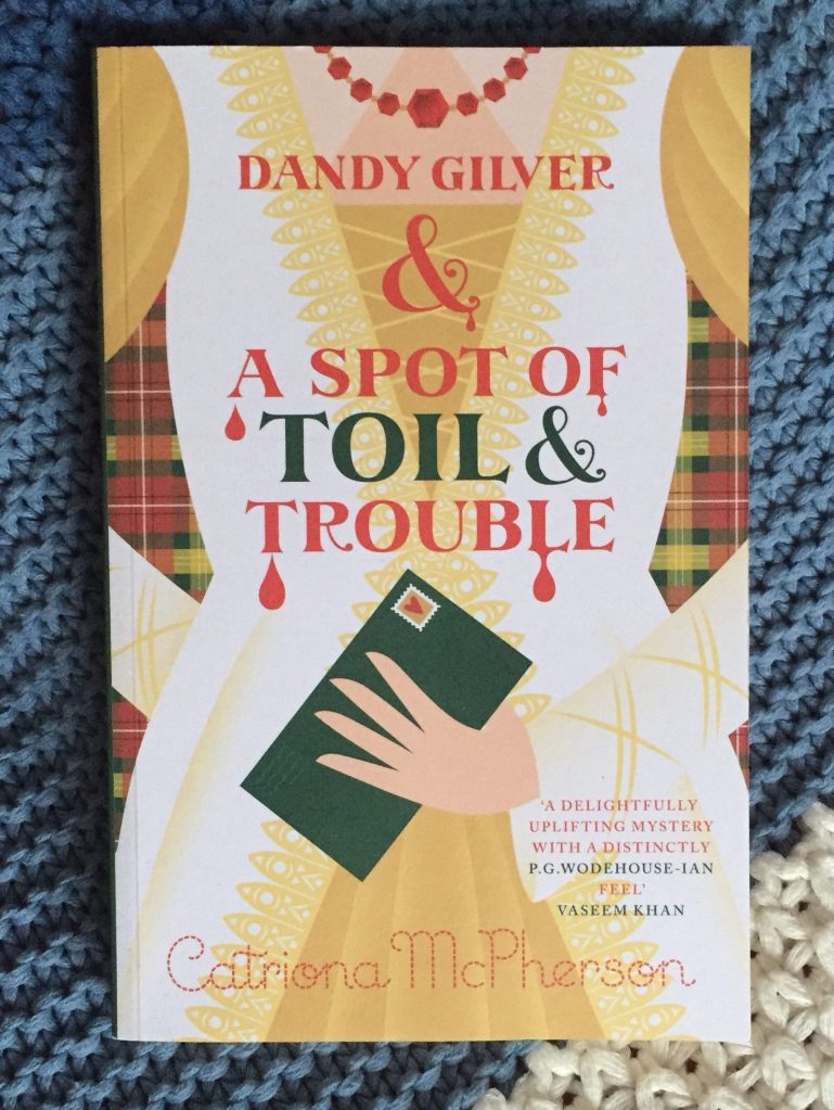 paperback copy of Dandy Gilver and a Spot of Toil and Trouble